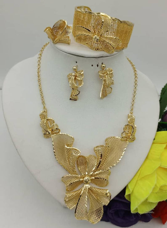 18 carat replica gold replica sets (necklace, earring, bracelet and ring)