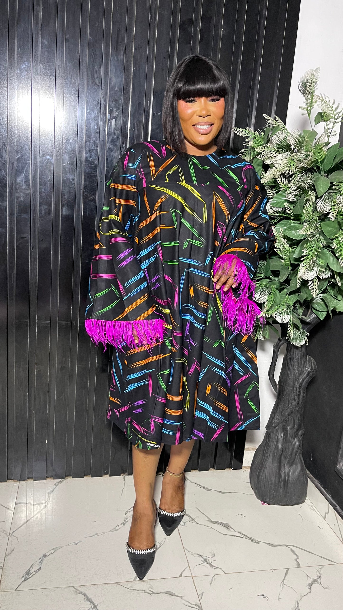 Yemmy Free Size Stylish Ankara African dress with feathers
